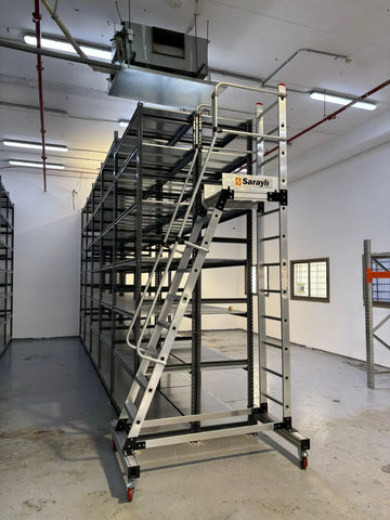 סולם אלומיניום עם פלטפורמה לסידור מדפים ומלאי במחסנים 9+1 שלבים לגובה עבודה 4.65 מ' - 0